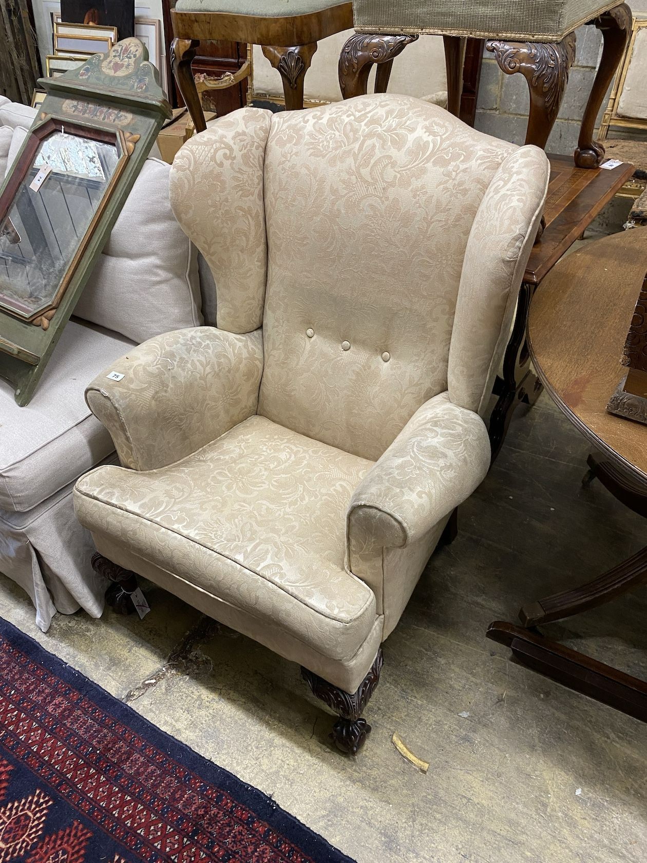 An early 20th century George III style upholstered armchair, width 80cm, depth 74cm, height 104cm